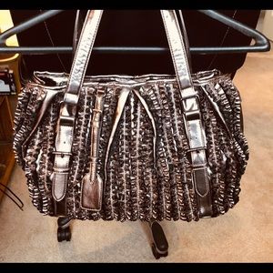Woman’s pouch style handbag by Galian, New York